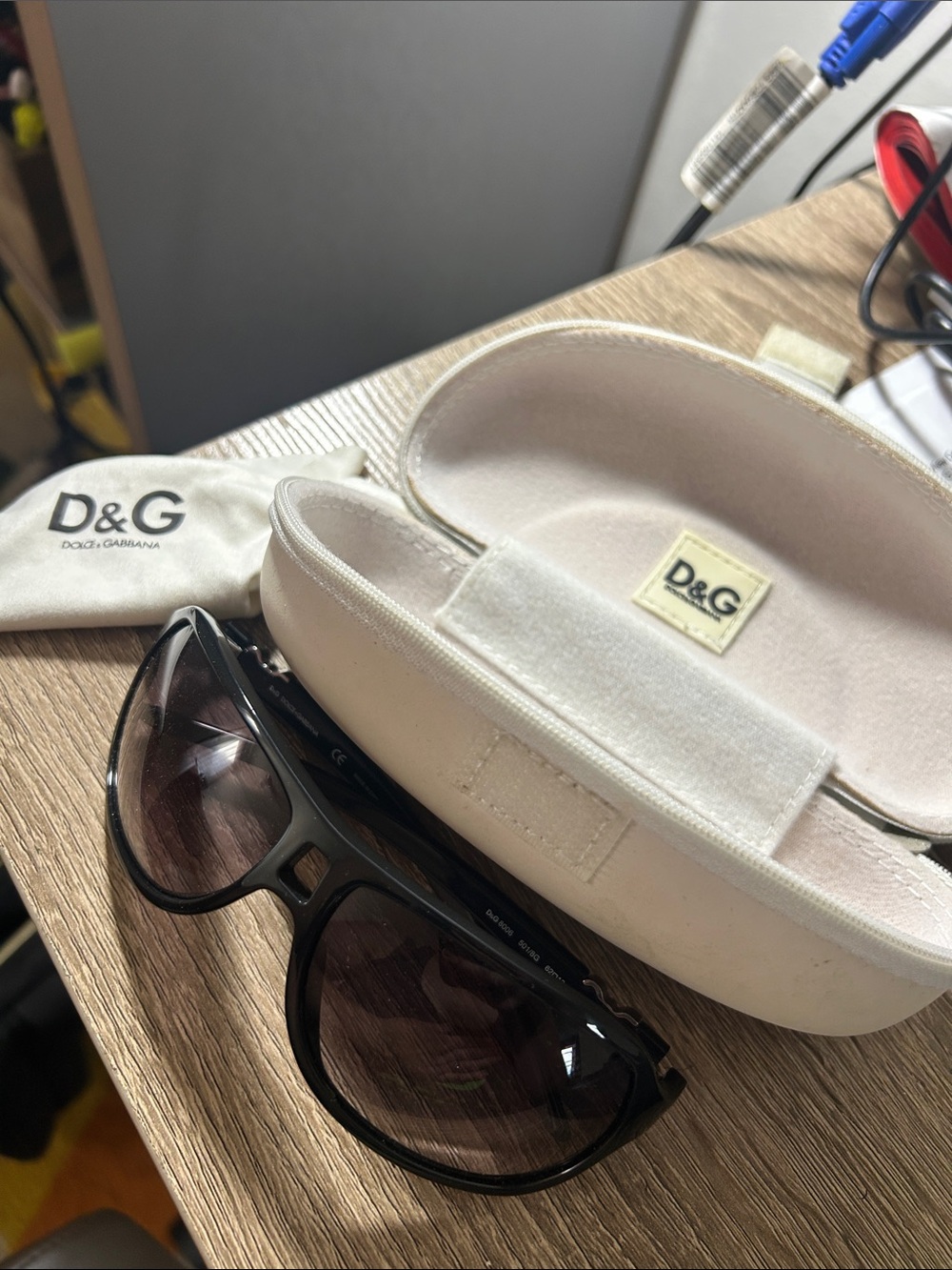 D&G Women’s White Case with Black Frame Sunglasses